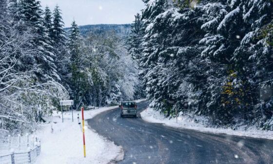 ASR - a car driving down the street in winter