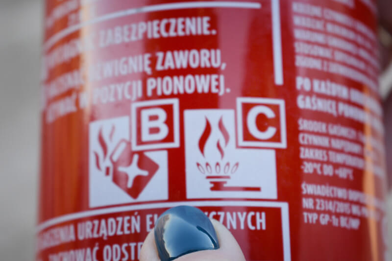 Markings on a car fire extinguisher