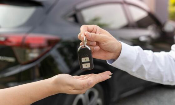Giving keys from a car rental company
