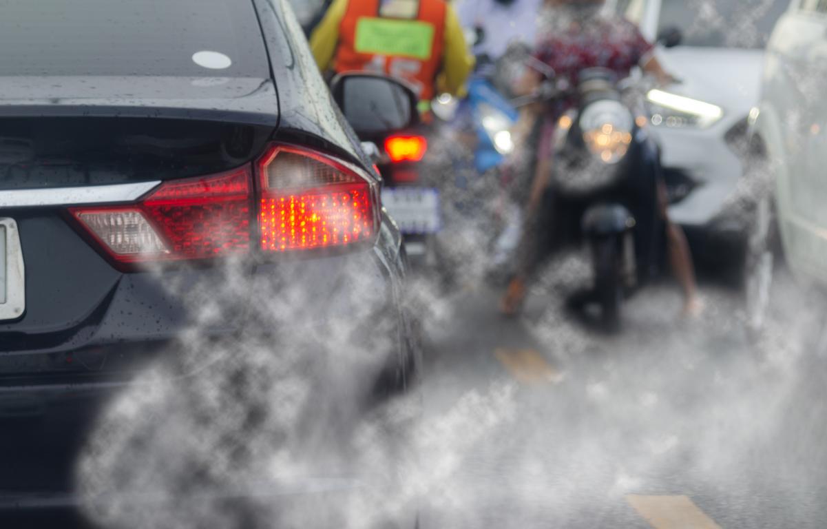 SCT - exhaust fumes from a car in a traffic jam SCT - car exhaust fumes